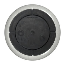 Round plastic planter underside with drainage base insert, textured surface