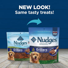 Two Blue Nudges Grillers dog treat bags with a “New look” banner overhead