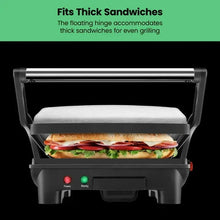 3-in-1 panini press grill with closed lid and sandwich inside, power lights visible