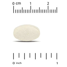 Magnesium chelate tablet, oval white, shown with inch and cm scale