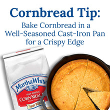 Self-rising corn meal mix bag with a baked cornbread piece in a pan