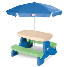 Kids picnic table with blue umbrella, beige tabletop, green bench, and blue base