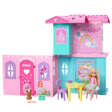 Doll house playset front with Chelsea doll, pink and teal doors, rainbow wall decor
