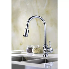 Chrome pull-down kitchen faucet with single handle and curved spout over sink