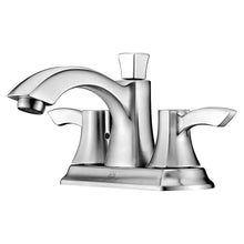 Chrome deck faucet with arched spout and two handles.