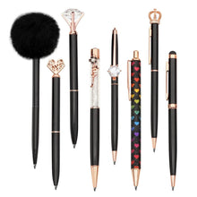 Black journaling pens set with rose-gold caps and varied crystal-style decorations