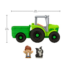 Green tractor toy with two included figures: boy character and black-and-white dog