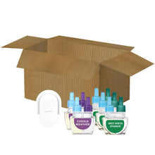 Febreze PLUG warmer and five assorted scent refills, including Cuddle Weather and Sweet Winter Spearmint