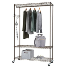Bronze rolling garment rack with hanging bar, wire shelves, caster wheels, folded clothes