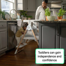 White step stool with light-wood legs and front tray for kitchen counter access