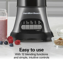 Black blender base with control buttons and smoothie cups around