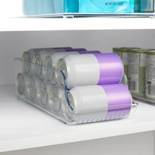 Clear kitchen bin with two rows of purple-lidded containers and white storage jars