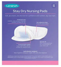 Lansinoh stay dry nursing pads, white pads with adhesive strips shown on package
