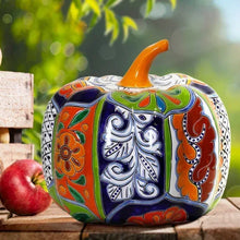 Ceramic pumpkin decor with blue, white, green, orange, and red Talavera-style art