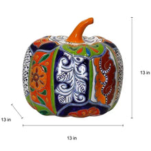 Talavera-style ceramic pumpkin with orange stem, rounded body, and hand-painted borders