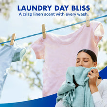Laundry day bliss concept with hanging shirts and a person holding folded fabric