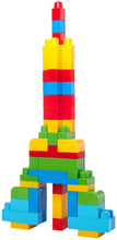 Colorful plastic block tower with red top, blue middle, yellow base, and green accents