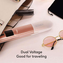 Rose-gold dual-voltage hair straightener with black cord and travel case