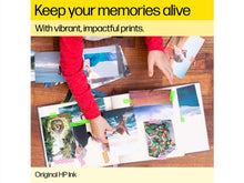 Color printed photo sheets with vibrant images on a table