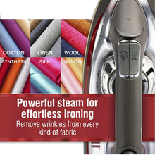 CHI iron with steam vents, shown beside colorful fabric swatches for ironing
