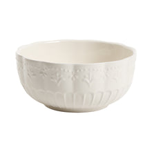 White embossed serving bowl with scalloped rim texture