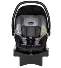 Infant car seat with handle, padded headrest, and Evenflo branding, front view