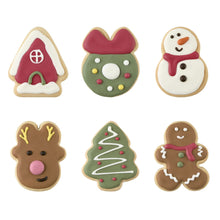 Hand-decorated dog cookies in six holiday designs, including a house, snowman, and tree