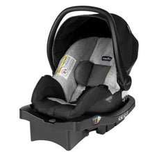 Infant car seat with side wings, gray insert, and Evenflo logo, side view