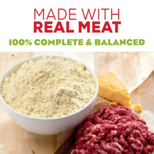 Dog food ingredients display with bowls of powder and ground meat