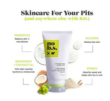 White whole-body natural deodorant tube with green yellow label.