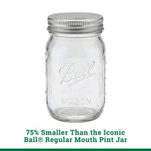 Clear glass mini mason jar with silver lid, embossed Ball and Mason