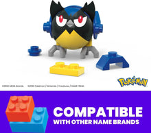 Rookidee action figure with large white Poké Ball and blue base pieces