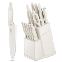 White kitchen knife set with block, multiple knives and a sharpener in a white stand