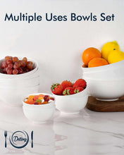 White ceramic multi-use bowls set with fruit and snack portions