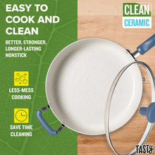 Blue ceramic non-stick cooker pan with speckled interior and curved side handles