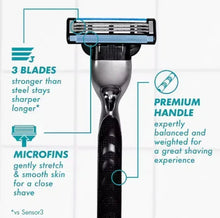 Gillette Mach3 razor cartridges with triple blade heads on dark handle base