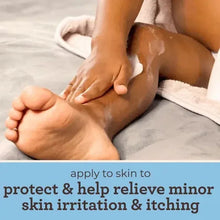 Baby eczema therapy moisturizing cream, hands applying to baby's foot and leg