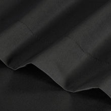 Microfiber sheet fabric in dark gray/black with stitched seam and soft drape