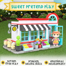 General store dollhouse playset with doll figure and front counter display
