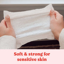 Baby wipes pulled from pack, soft and strong for sensitive skin
