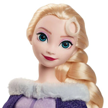 Elsa fashion doll head with blonde braid, blue eyes, and red lips