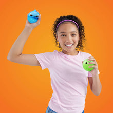 Green reusable animal water balloon in kid’s hand, with small blue balloon above