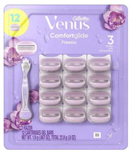 Gillette Venus scented razor with 12 refill cartridges in blister pack, purple handle