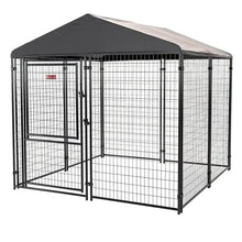 Large black metal dog kennel with arched roof and wire privacy panel