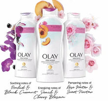 Olay body wash bottles with purple and pink pumps, three-pack, floral accents