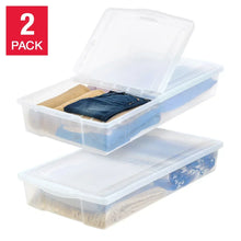 2-pack clear underbed storage bins, lids open with folded clothes inside