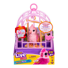 Pink bird in purple cage with yellow swing, shown in retail packaging