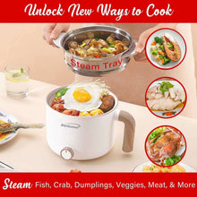 Brentwood hot pot cooker with steam tray and open lid, cooking steaming food