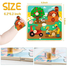 Wooden peg puzzle board with a farm scene and a small wooden barn piece
