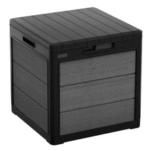Grey resin deck storage box with textured slatted lid and front latch for patio